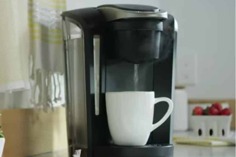                                                Keurig brewer dispensing water during rinse cycle